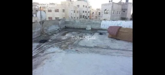 سطح خالي من البناء في الذراع الشمالي بعمان - 13