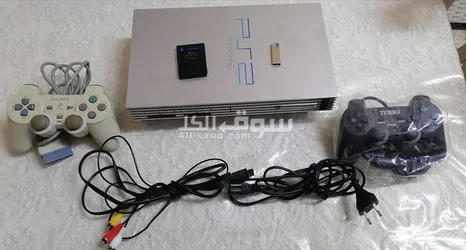 بلايستيشن 2 مع ايدتين تحكم وكامل اغراضها عليها بكج 30 لعبة معدلة للبيع بسعر جيد
